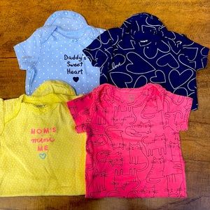 Lots of 6 month girls Carter’s onesies